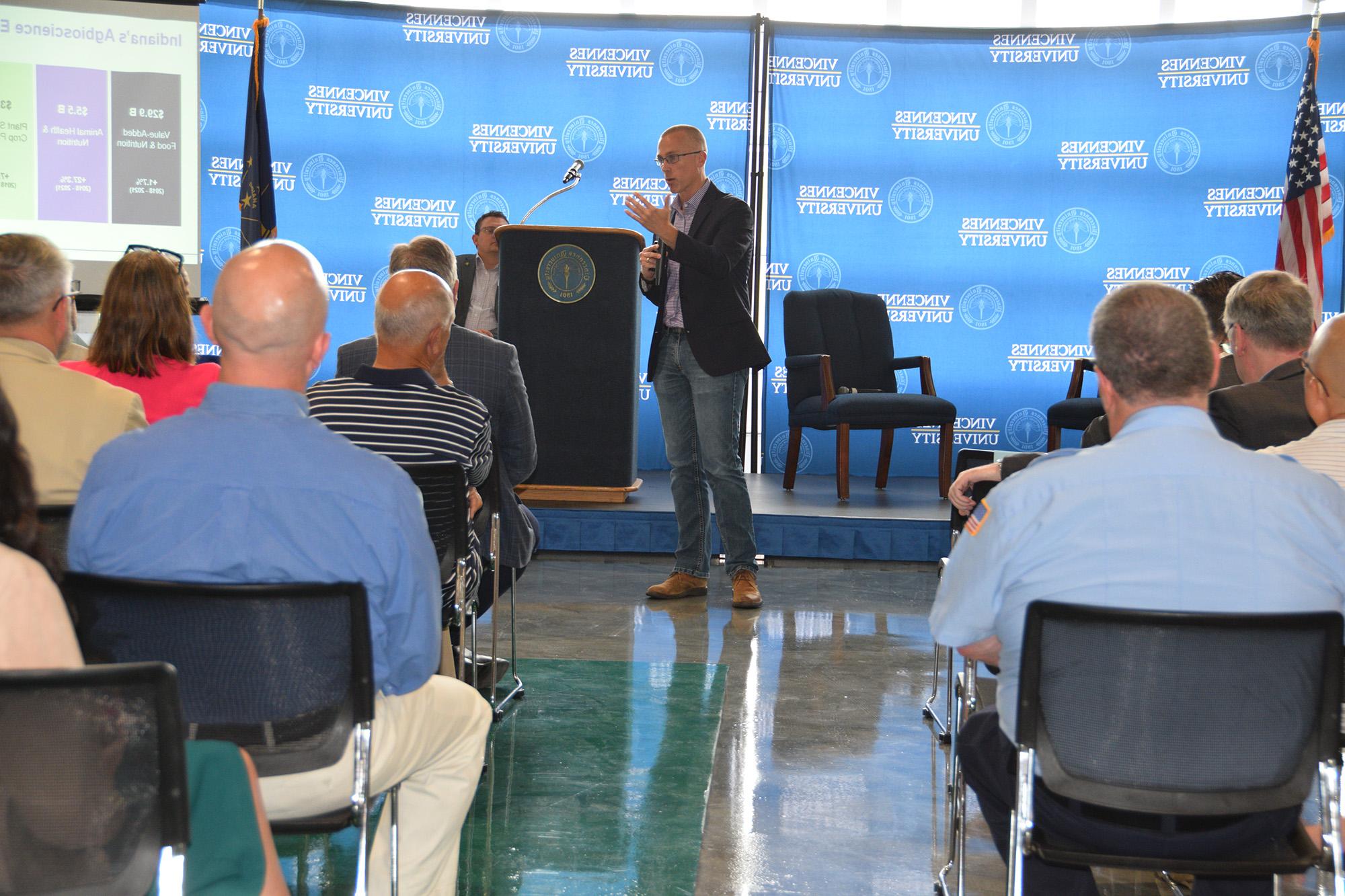 Mitch Frazier speaking at an event for agriculture and bioscience